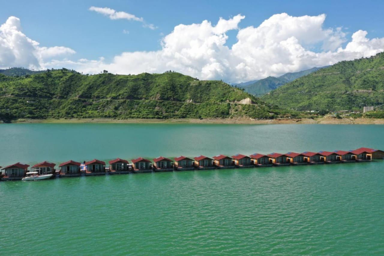 Floating Huts Over the Lake Complimentary Two-way Port Transfers