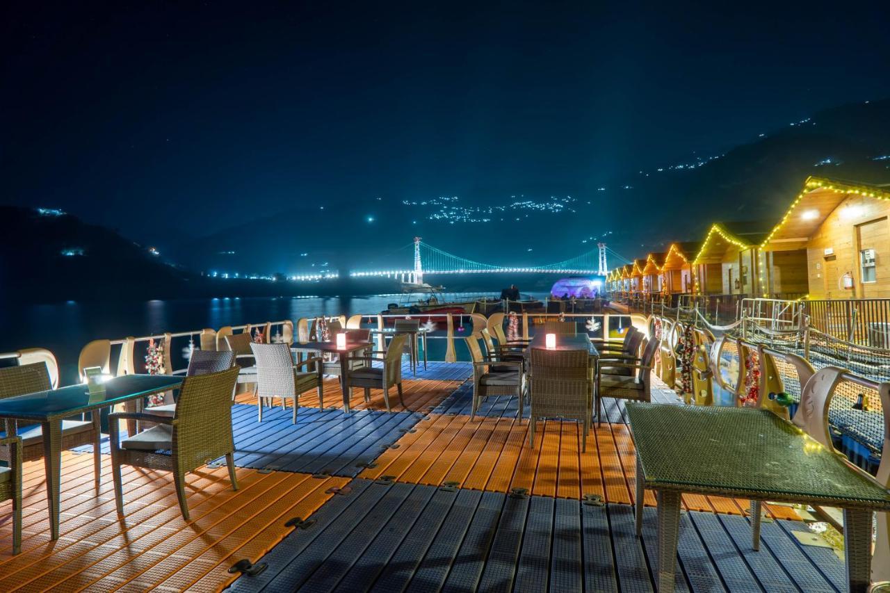 Floating Huts Over the Lake Complimentary Two-way Port Transfers