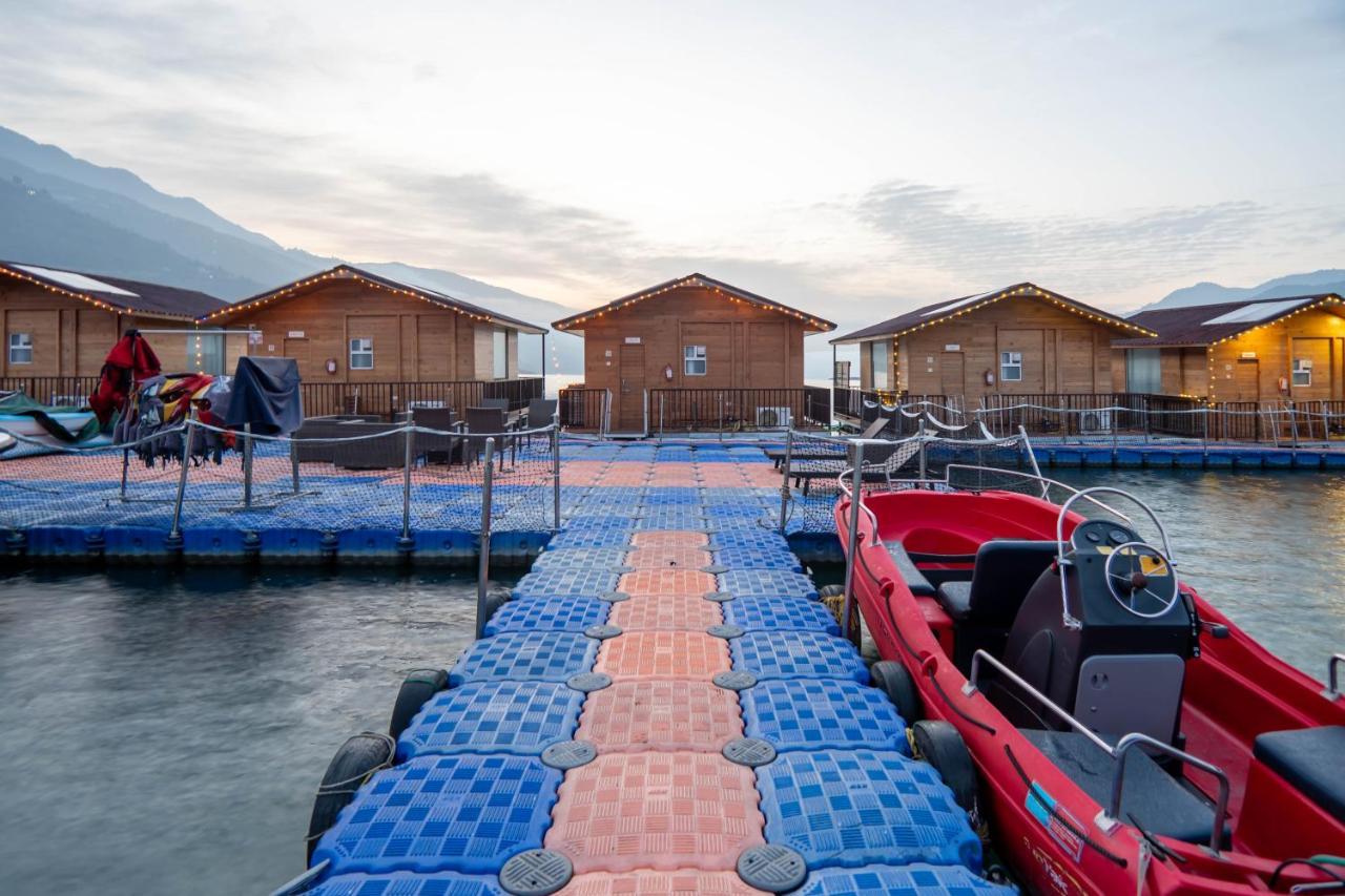 Floating Huts Over the Lake Complimentary Two-way Port Transfers