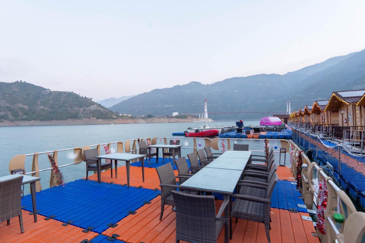 Floating Huts Over the Lake Complimentary Two-way Port Transfers