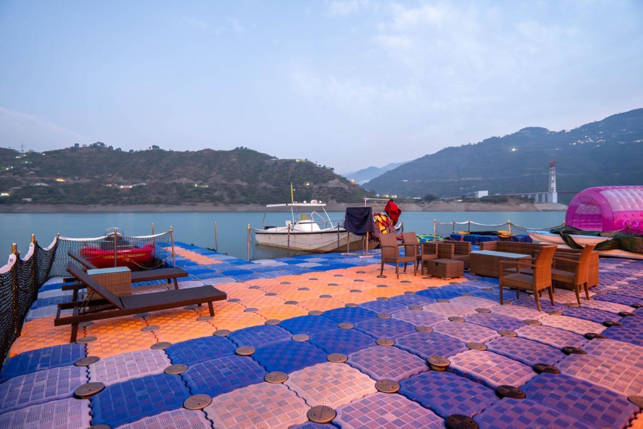 Floating Huts Over the Lake Complimentary Two-way Port Transfers