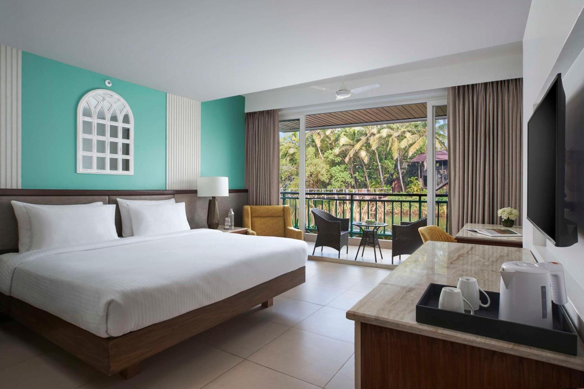 Deluxe Room with River View & Balcony - 1 child below 12 stays for free (upto 30 Sep 2026 check-in) + Beer on arrival + Happy Hours (6-8PM),1507652806:JPEG