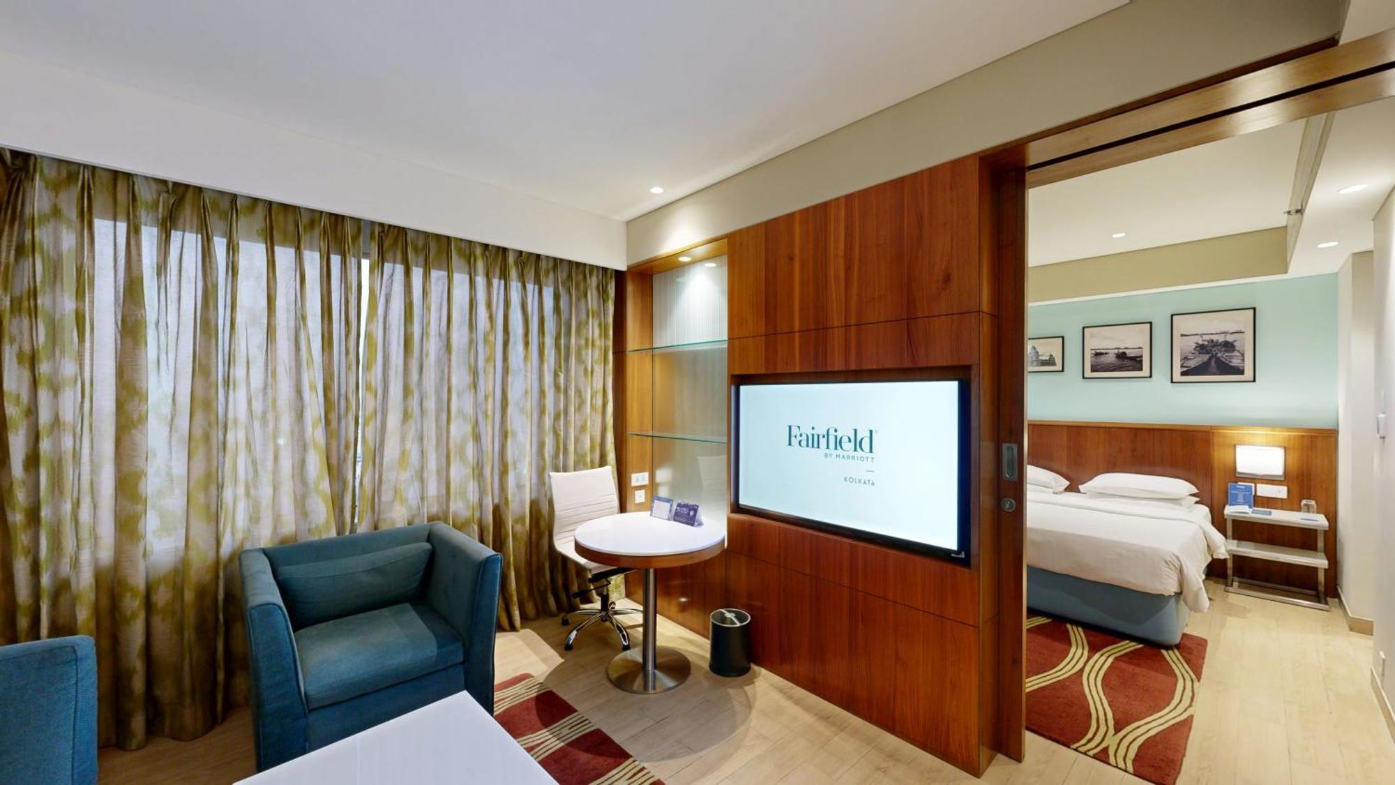 Fairfield Suite One-way airport transfer & INR 1000 Hotel Credit per