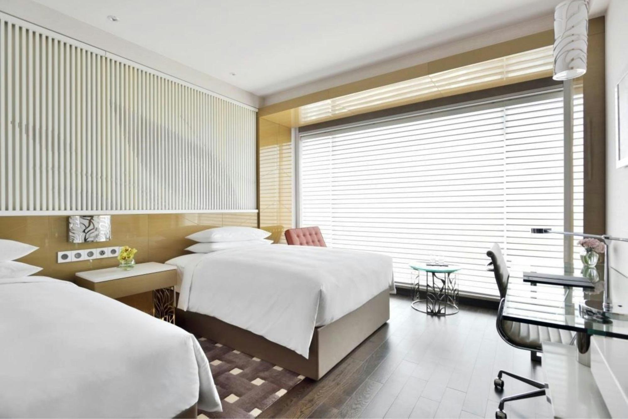 2 Twin Beds, High Floor - 10th and above, Guest Room INR 500/- Credit or 2 Pints of Beer on Arrival per room per stay