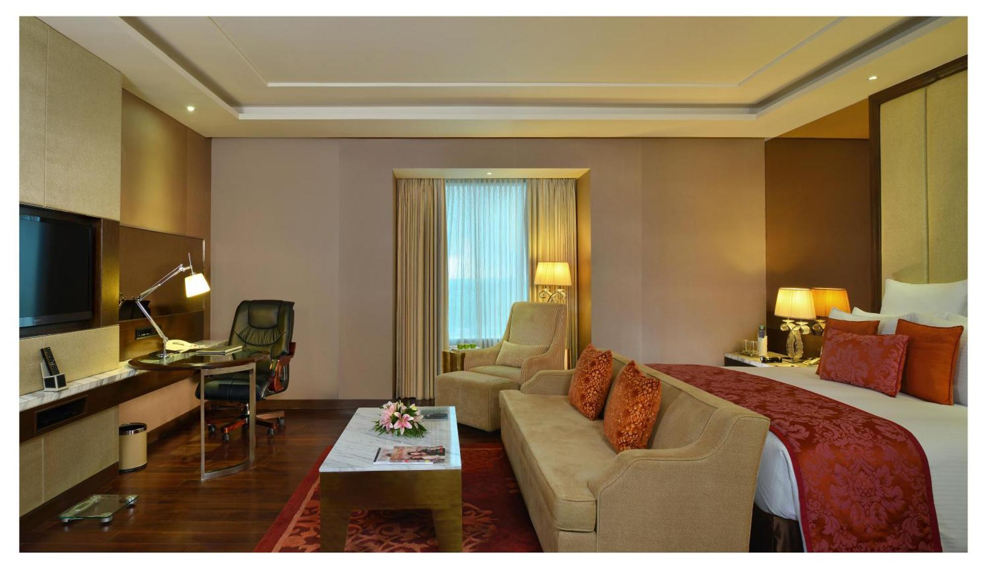 Junior Suite with Bathtub Non Smoking Room with 02 beer or 02 Pegs(IMFL) or 02 Mocktails and 02 pcs laundry, Complimentary INR 500 Hotel Credit redeemable on Food & Soft Beverages, 50% off on Mini Bar,807904614:JPEG