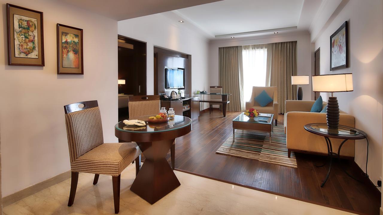 Suite (2 Way Airport Transfer,20% off on SPA, 4pcs of Laundry/room/nightI,INR 2000 F&B credit,Daily Fruit basket, 1 bottle of whiskey/wine as per availability, Dinner in Dragon If all meals room is booked, Sightseeing transport services and Lounge Ac,633306186:JPEG
