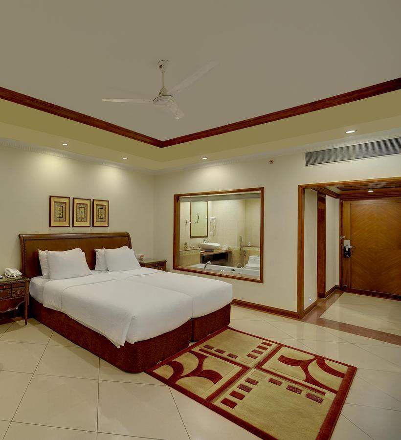 Deluxe King Room -  10% Discount on Foods & Soft Beverages* | 15% Discounts on Laundry Services* |  Free Minibar - 2 cans of soft Beverages (Once on Arrival) | Assorted Snacks in the Room (Once during Stay)