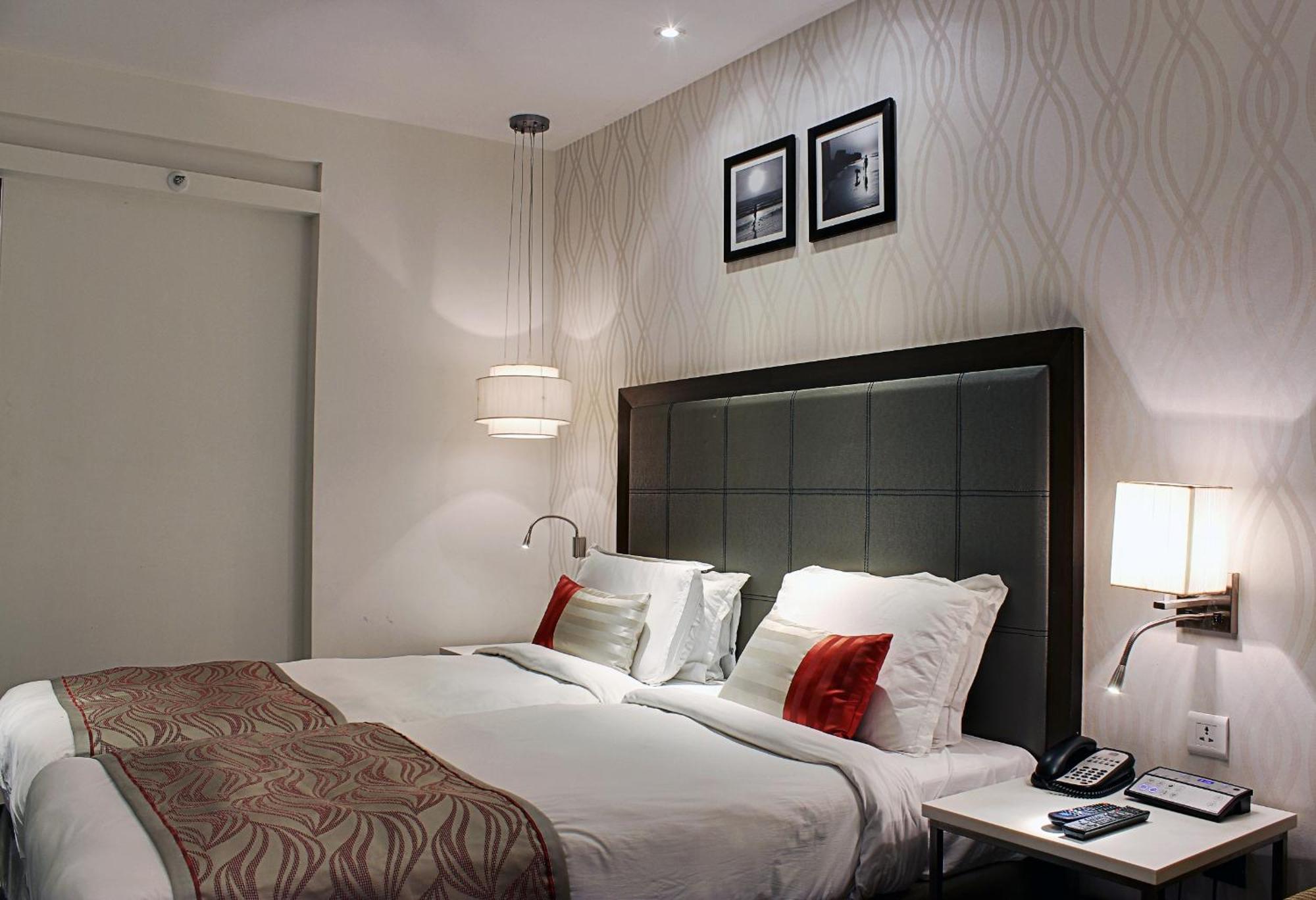 Deluxe Room King Bed with 15% discount on laundry and Food only,689998338:JPEG