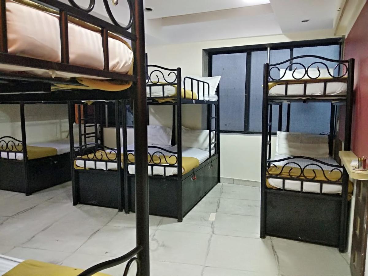 Single Bed in Male Dormitory Room with Shared Bathroom