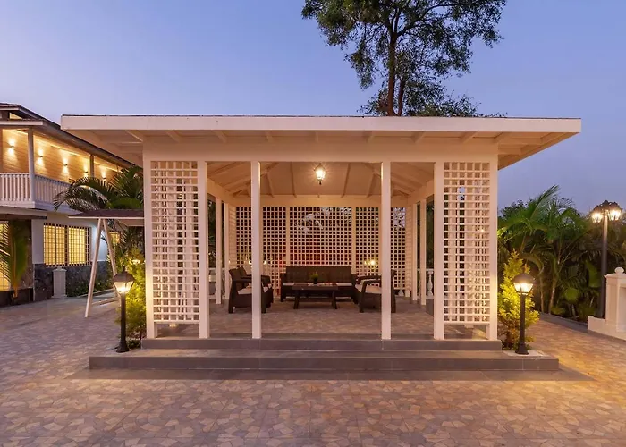Stayvista's Lake La Vie: Tranquil Lakeside Villa with Pool and Farmland Views